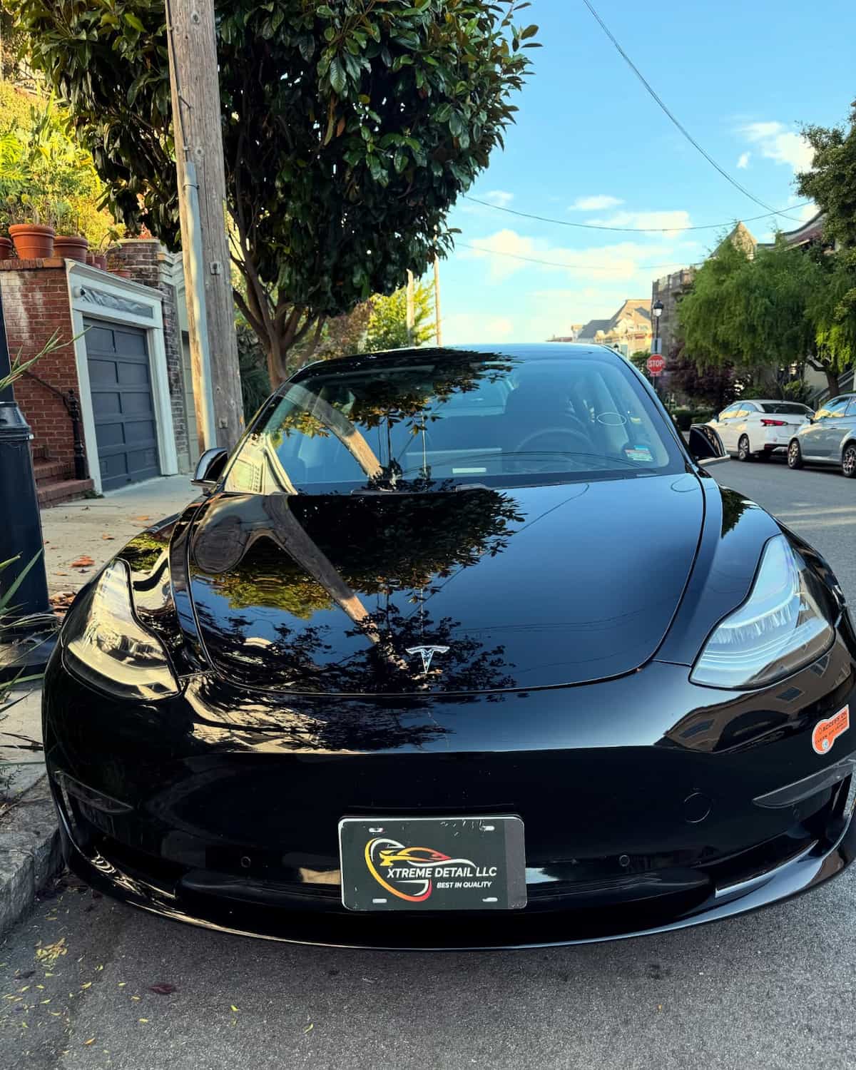 Black Sedan exterior hand wash and wax completed at a home in San Pablo, California