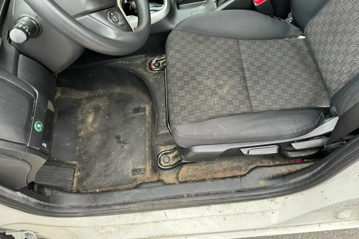 Car interior before professional detailing in Berkeley, CA